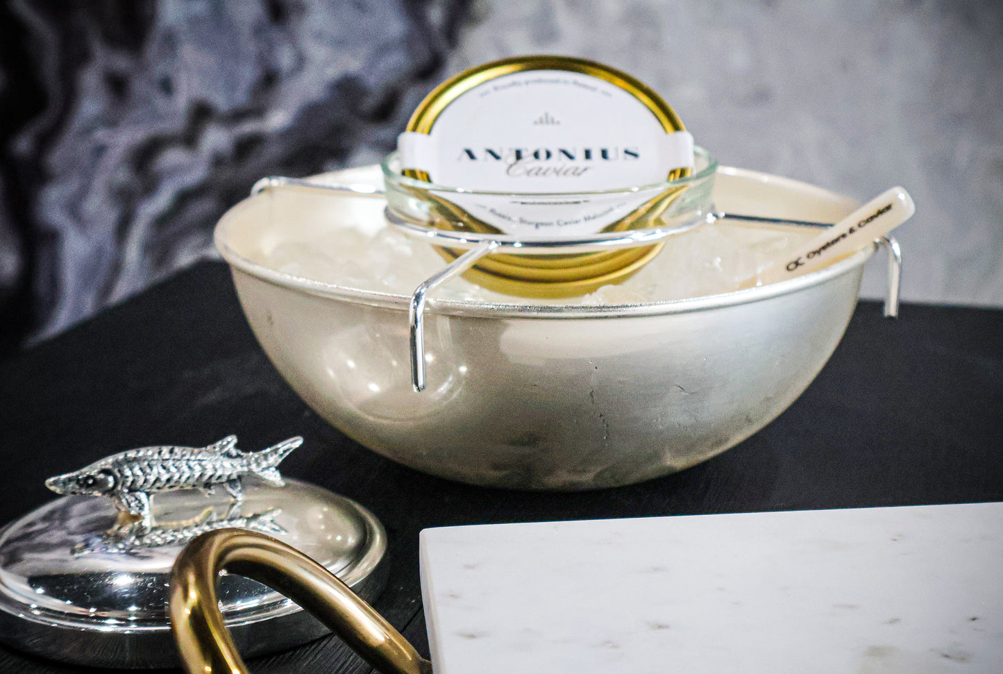 Silver Suspended caviar bowl with Sturgeon topper