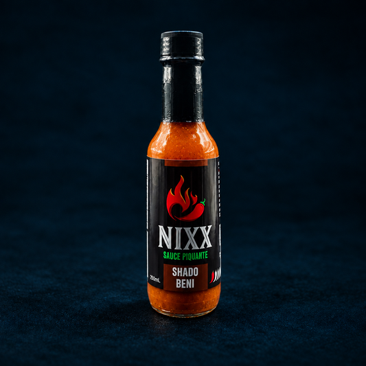 Shado Beni Hot-Sauce bottle on a Limey pepper-style background